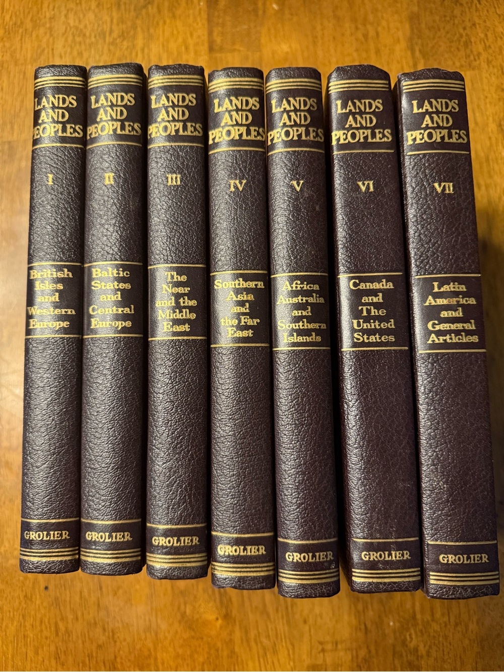 Grolier Lands and Peoples 7-Volume Book Set - Brown with Gold Lettering